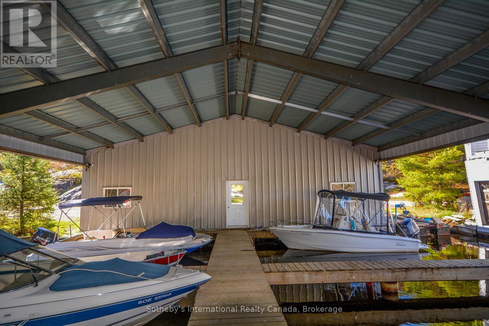 827 Go Home Lake Road, Georgian Bay, Ontario  P0C 1H0 - Photo 2 - X12093381