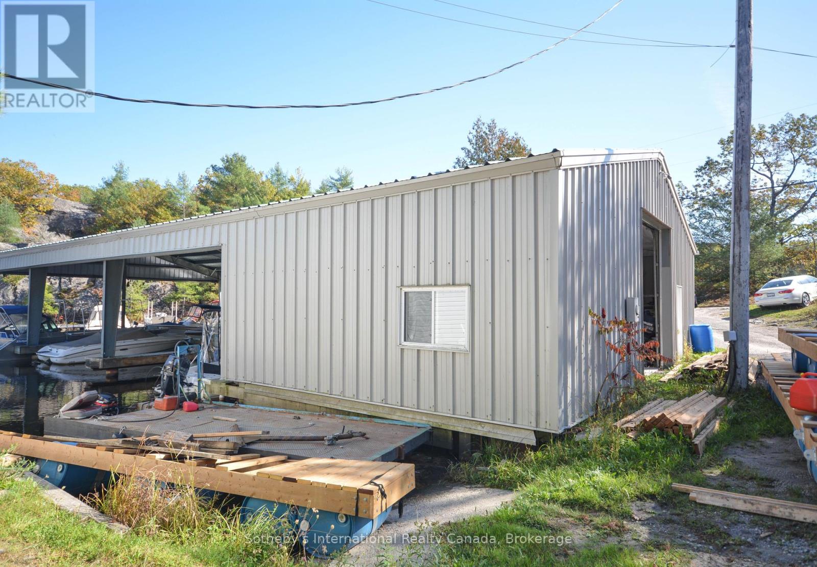 827 Go Home Lake Road, Georgian Bay, Ontario  P0C 1H0 - Photo 7 - X12093381