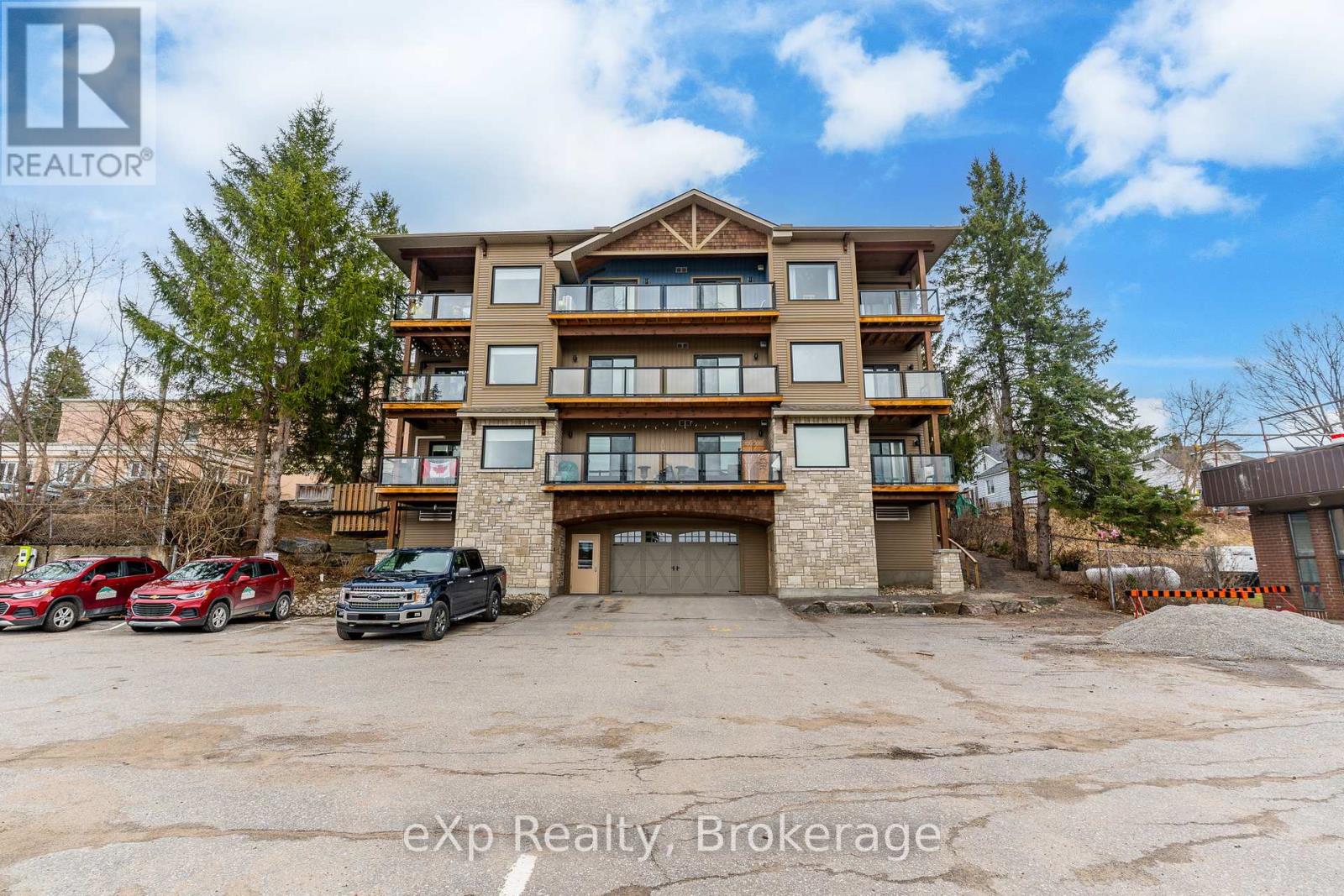 203 - 9 Newcastle Street, Minden Hills, Ontario  K0M 2K0 - Photo 1 - X12102275