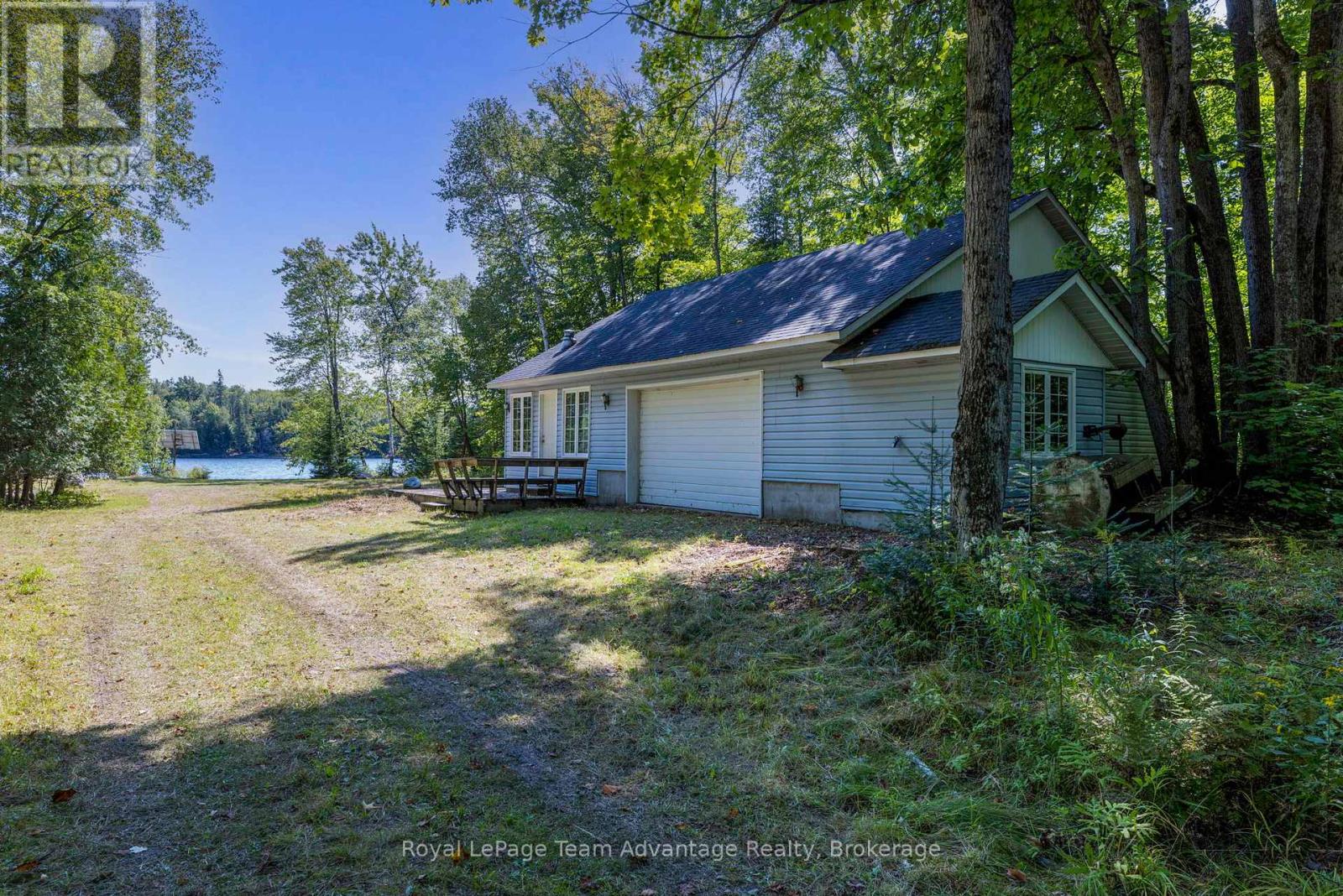 46 Taylor Lake Road, Whitestone, Ontario  P0A 1G0 - Photo 3 - X12129889