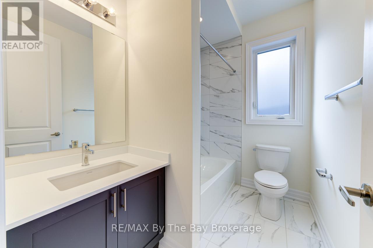 190 Mapleside Drive, Wasaga Beach, Ontario  L9Z 0L4 - Photo 7 - S12132377
