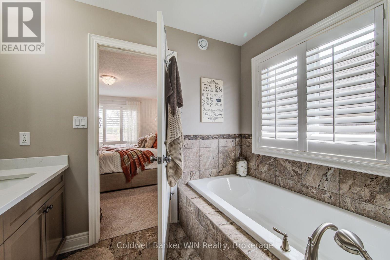 185 Rubys Crescent, Wellington North, Ontario  N0G 2L2 - Photo 32 - X12156010
