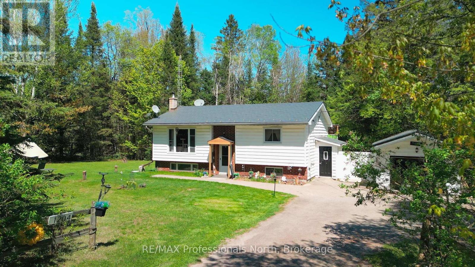 1204 Bacon Road, Minden Hills, Ontario  K0M 2K0 - Photo 2 - X12159850
