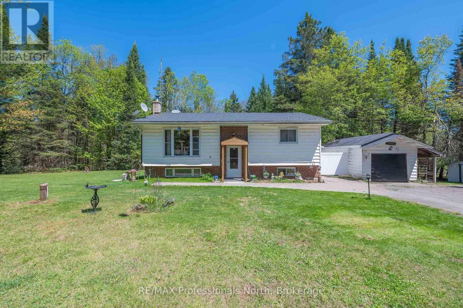 1204 Bacon Road, Minden Hills, Ontario  K0M 2K0 - Photo 4 - X12159850