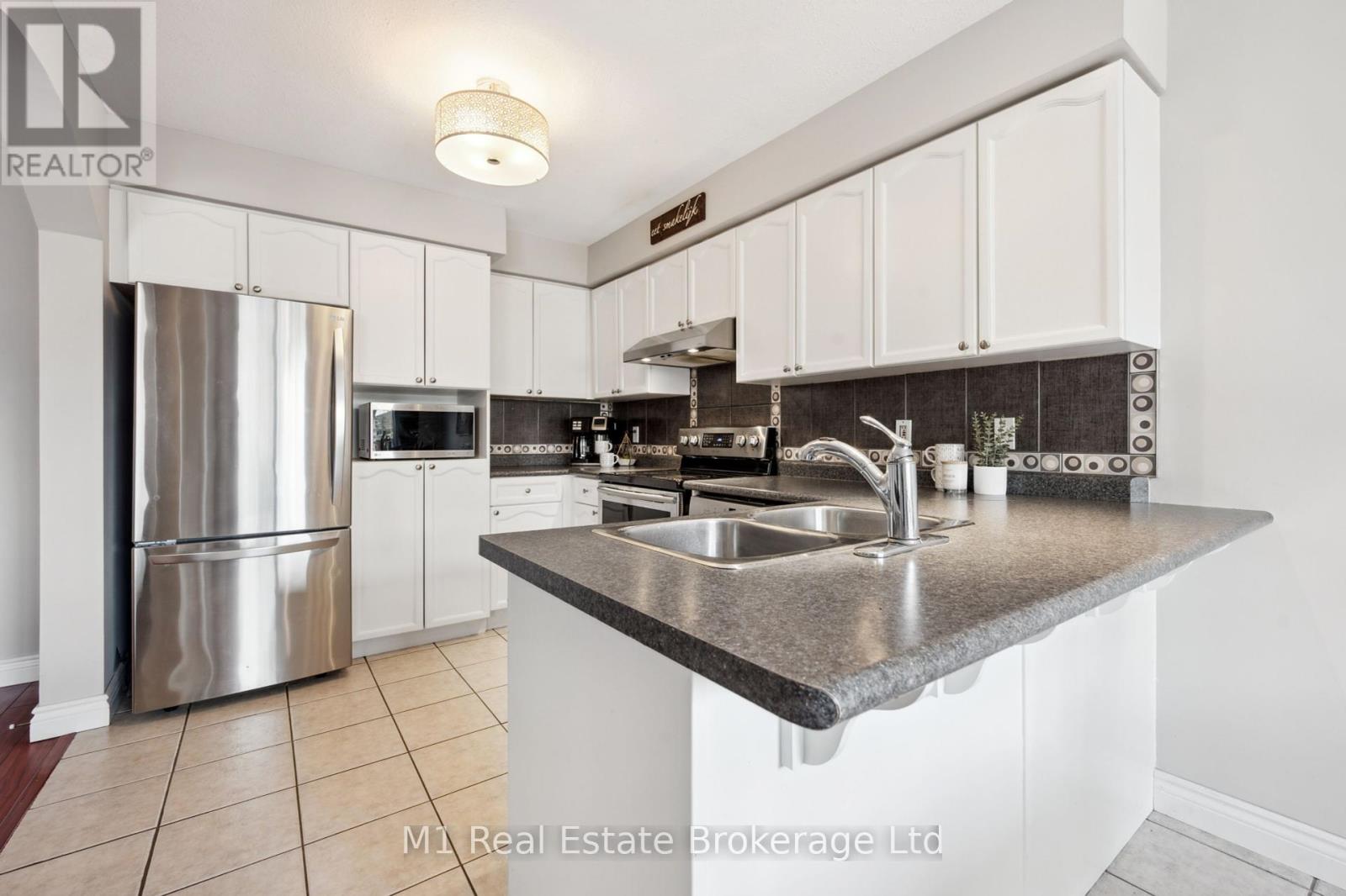 4 Sandcreek Lane, Guelph, Ontario  N1E 7K7 - Photo 12 - X12164652
