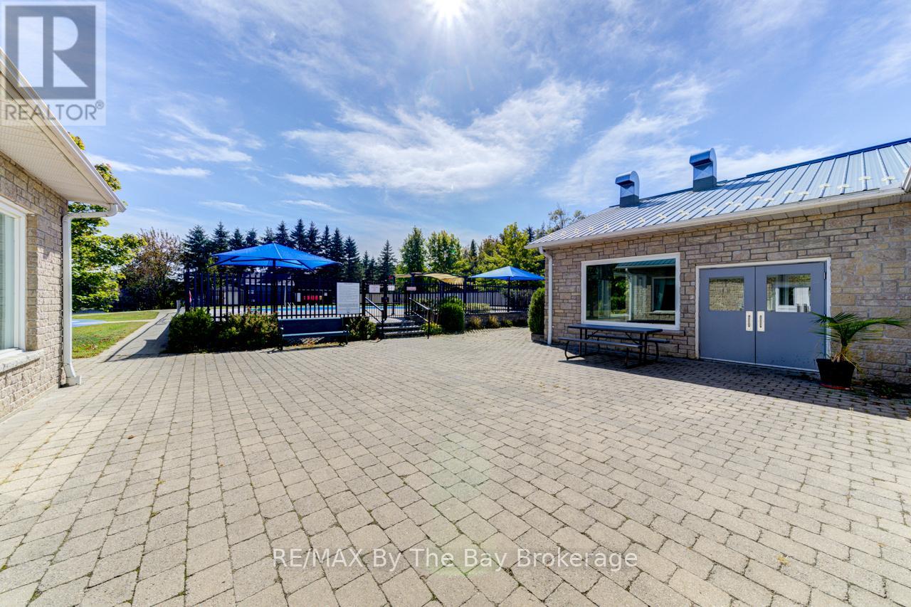 210 - 85 Theme Park Drive N, Wasaga Beach, Ontario  L9Z 1X7 - Photo 21 - S12180773
