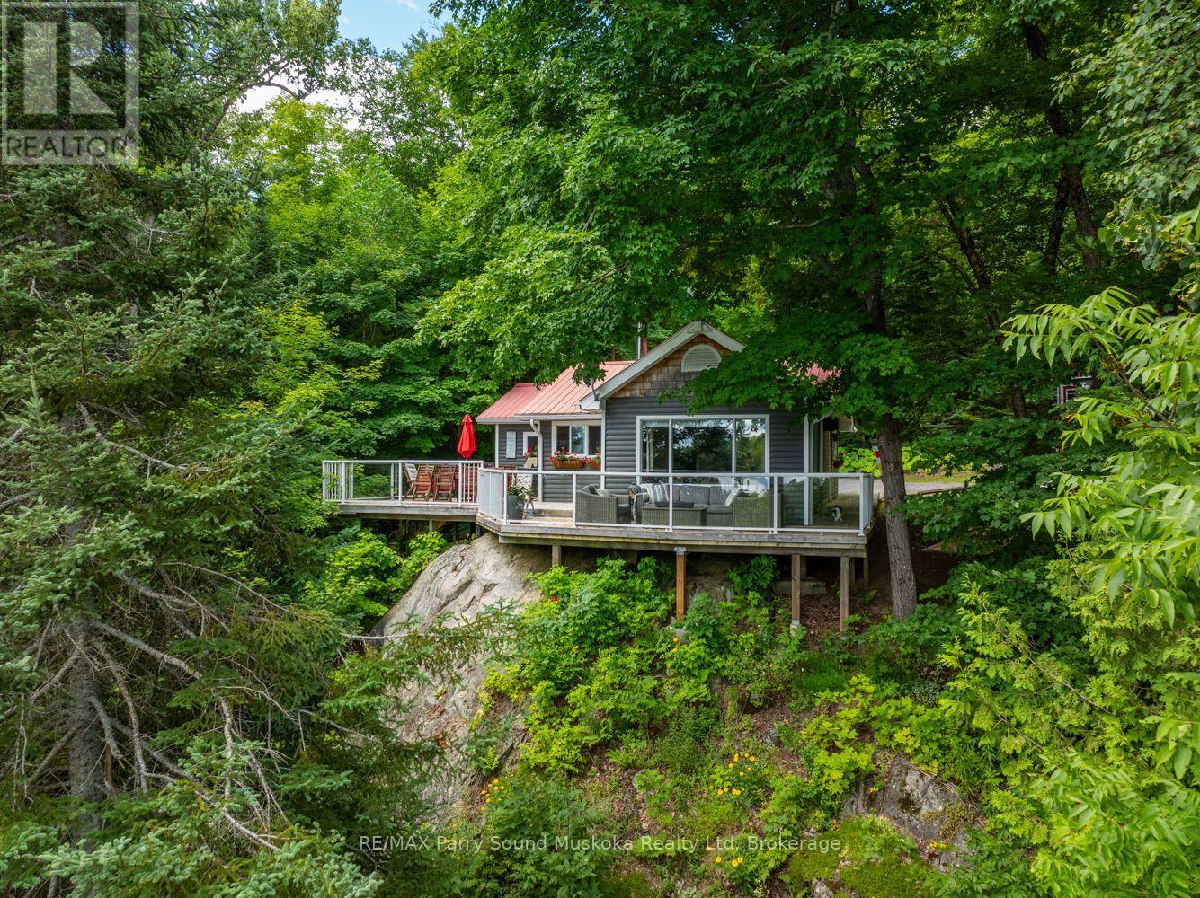 74 Captain Estates Rd, Whitestone, Ontario  P0A 1G0 - Photo 5 - X12182613