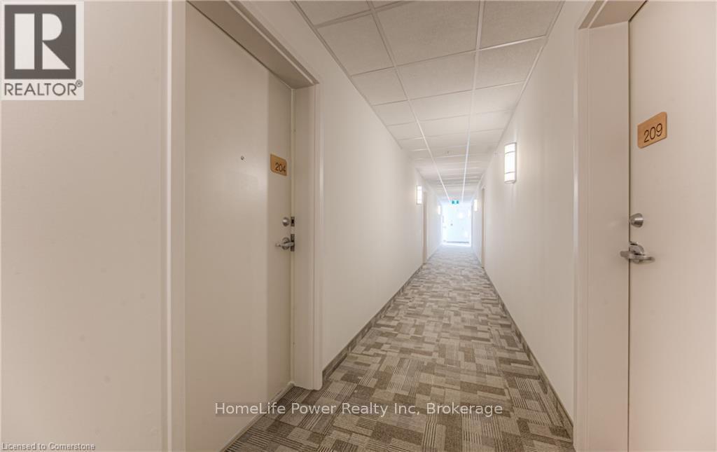 225 - 301 Westmount Road W, Kitchener, Ontario  N2M 5M9 - Photo 4 - X12191962