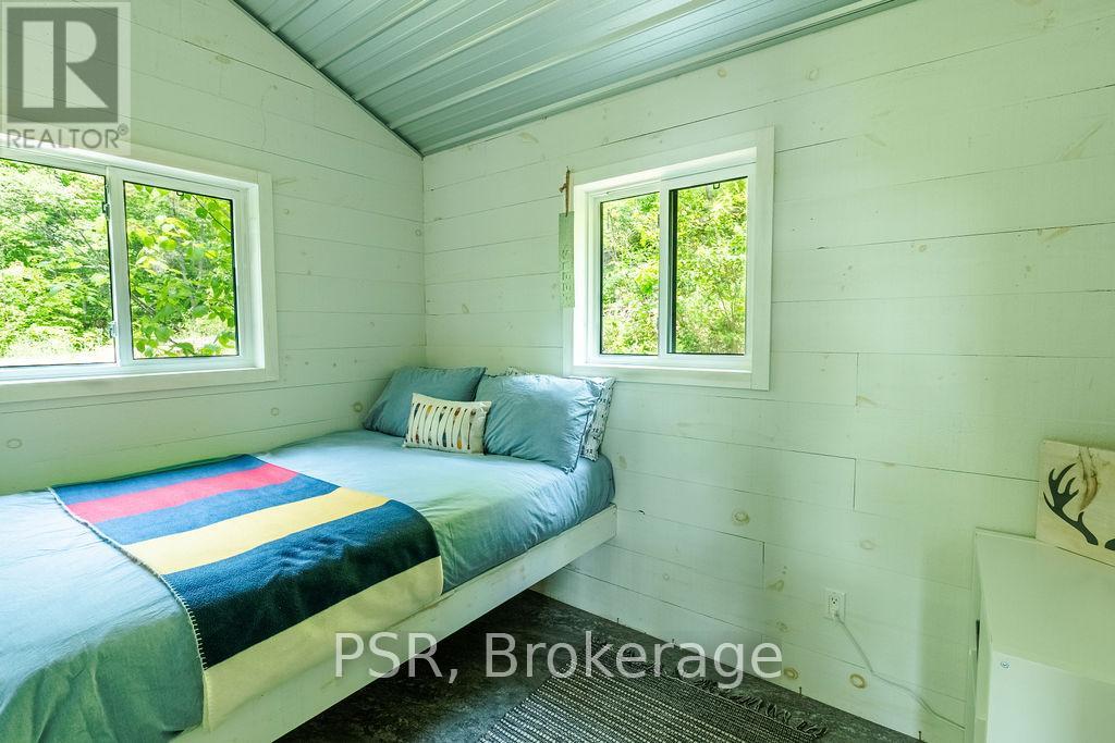 748 Big Island, Huntsville, Ontario  P0A 1R0 - Photo 11 - X12210115