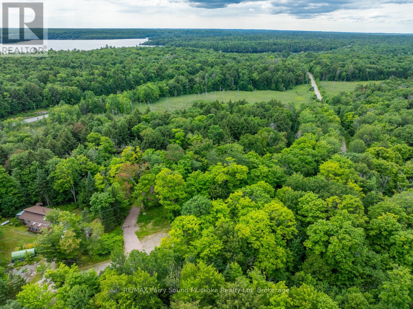 131 Moonwing Road, Magnetawan, Ontario  P0A 1A0 - Photo 2 - X12211059