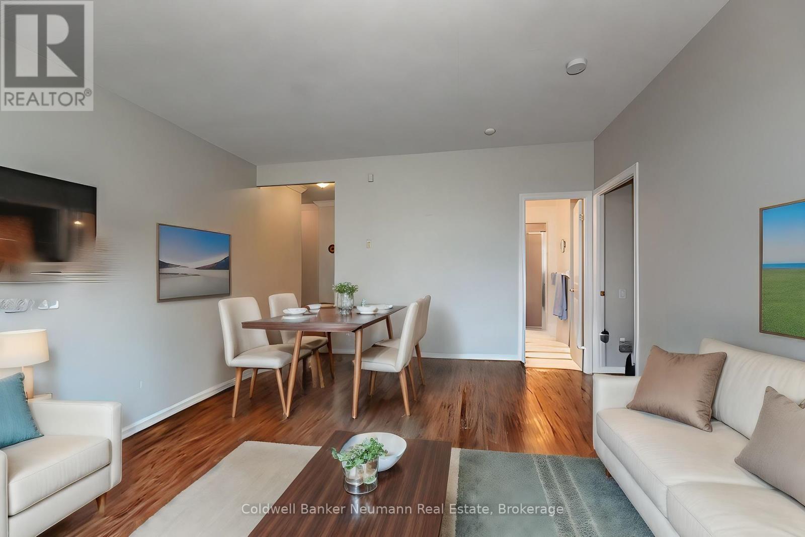 409 - 60 Old Mill Road, Oakville, Ontario  L6J 7V9 - Photo 3 - W12214446