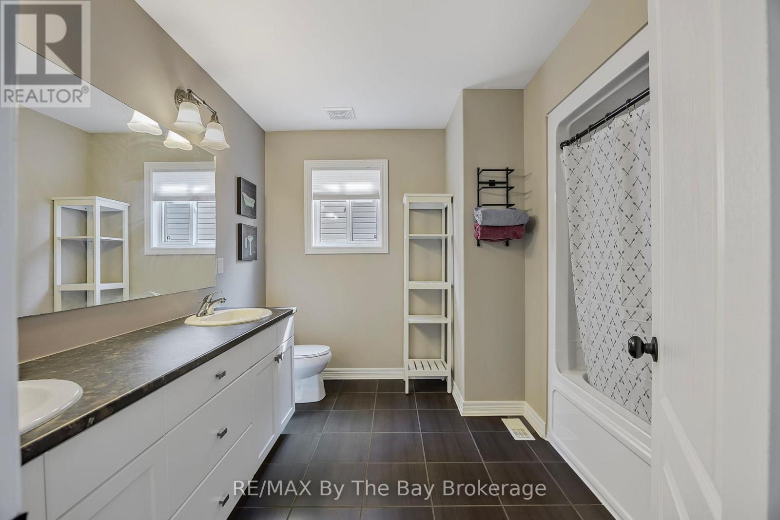 182 Banting Crescent, Essa, Ontario  L0M 1B6 - Photo 23 - N12220828