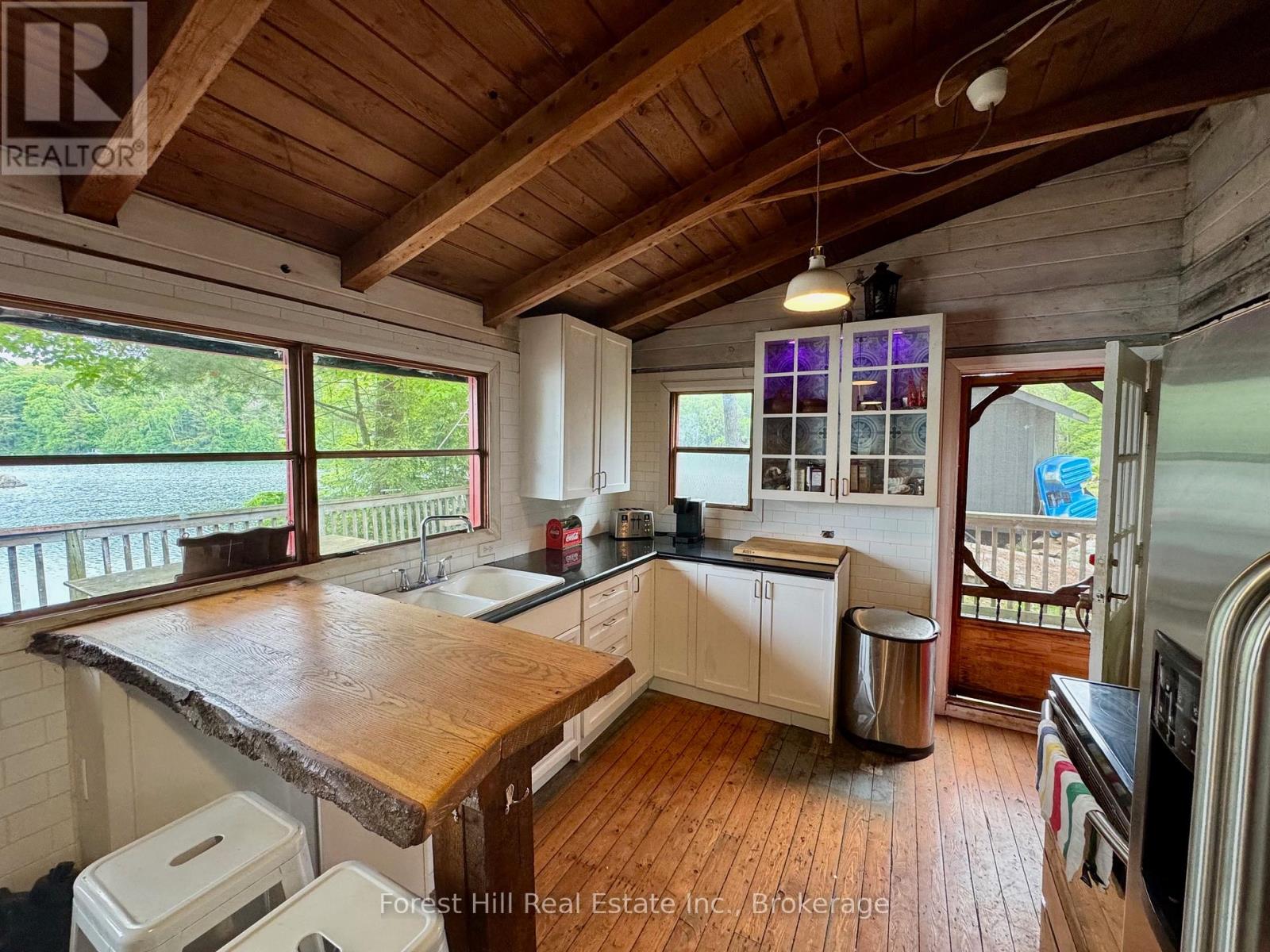 1293 Causeway Drive, Algonquin Highlands, Ontario  P0A 1E0 - Photo 34 - X12220894