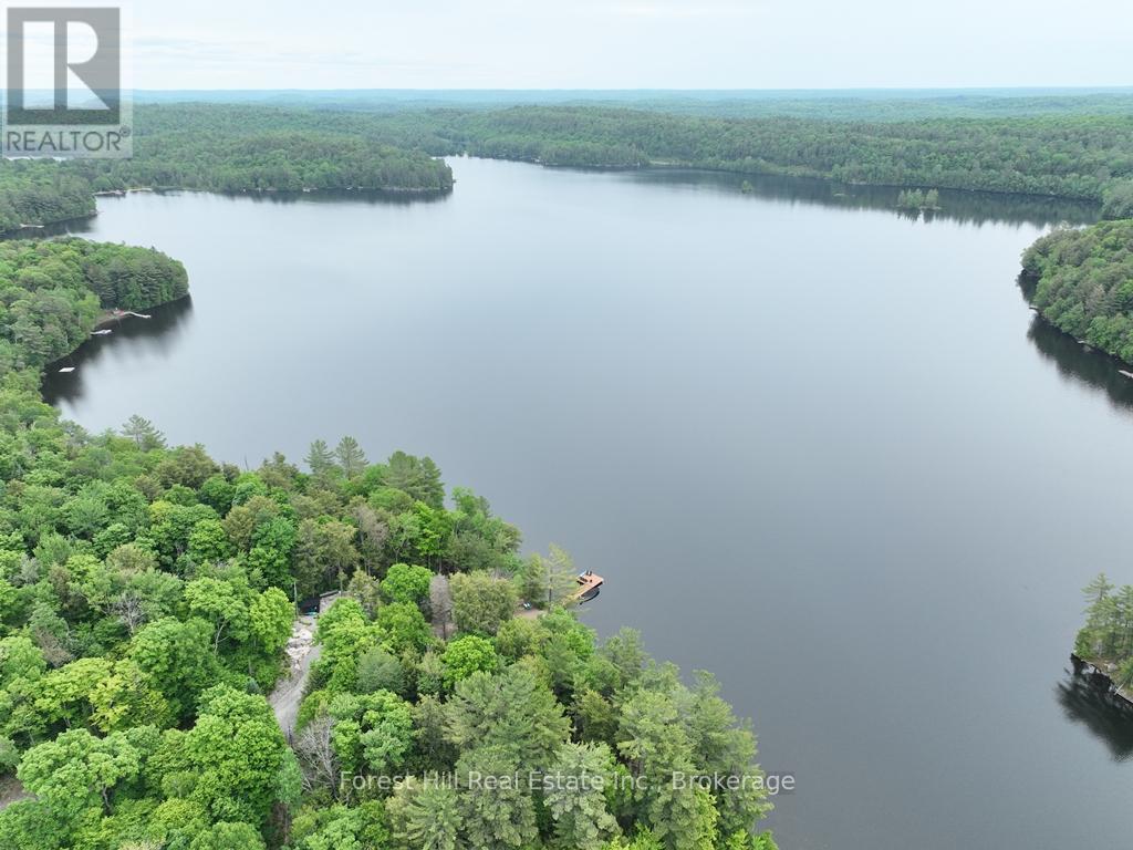 1293 Causeway Drive, Algonquin Highlands, Ontario  P0A 1E0 - Photo 5 - X12220894