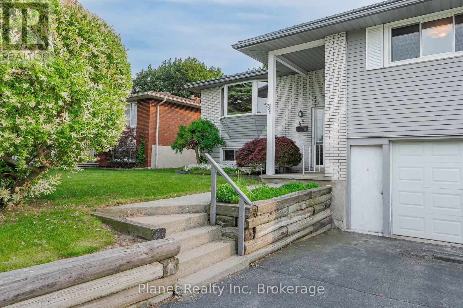48 Uplands Place, Guelph, Ontario  N1E 3R4 - Photo 4 - X12222551