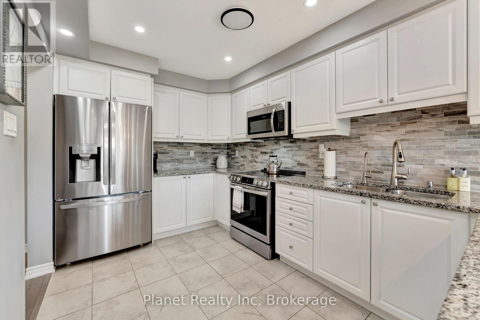 212 Waterbrook Lane, Kitchener, Ontario  N2P 0H7 - Photo 7 - X12228343