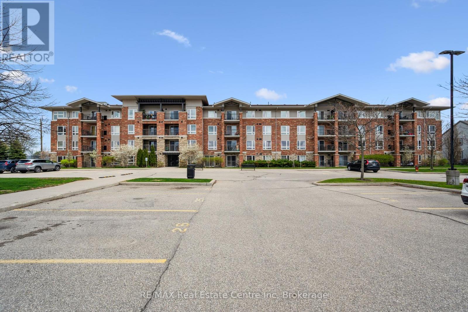 303 - 19 Waterford Drive, Guelph, Ontario  N1L 0G8 - Photo 1 - X12235198