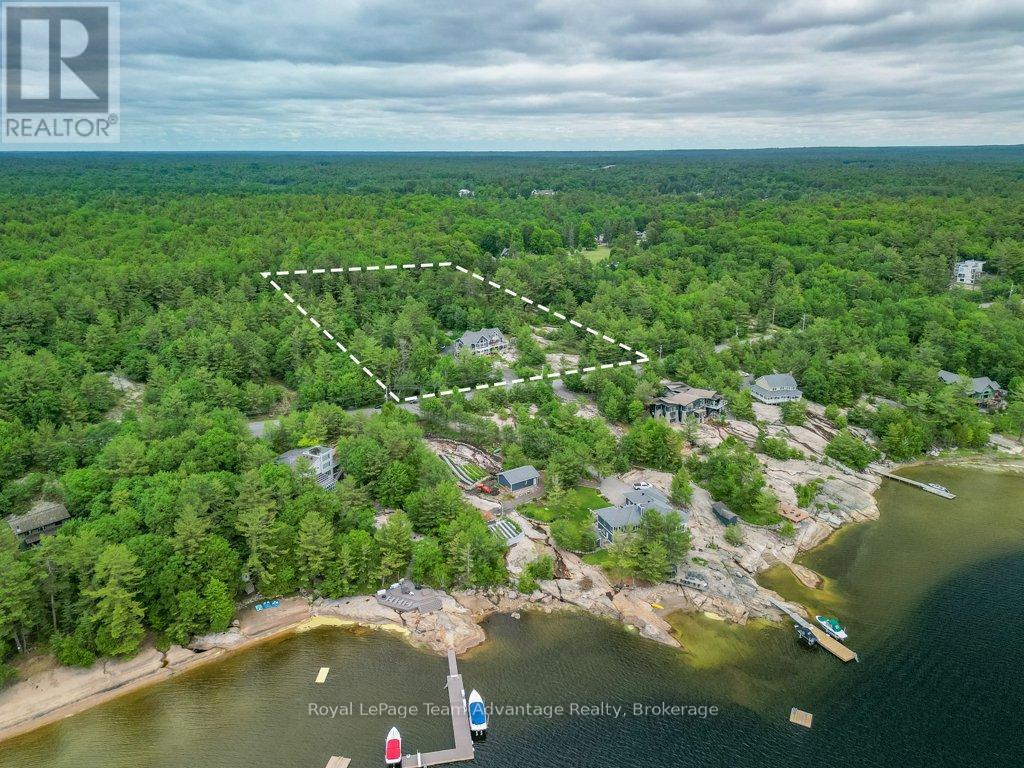 39 Big Sound Road, Mcdougall, Ontario  P0G 1G0 - Photo 2 - X12238154