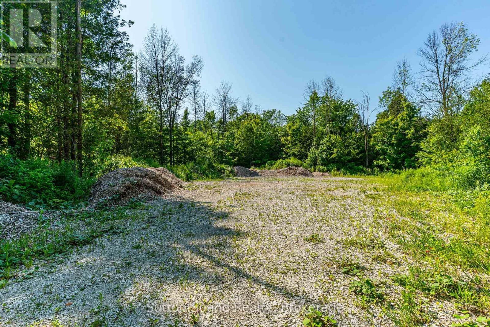 127 Big Rock Road, Georgian Bluffs, Ontario  N0H 2K0 - Photo 6 - X12241273