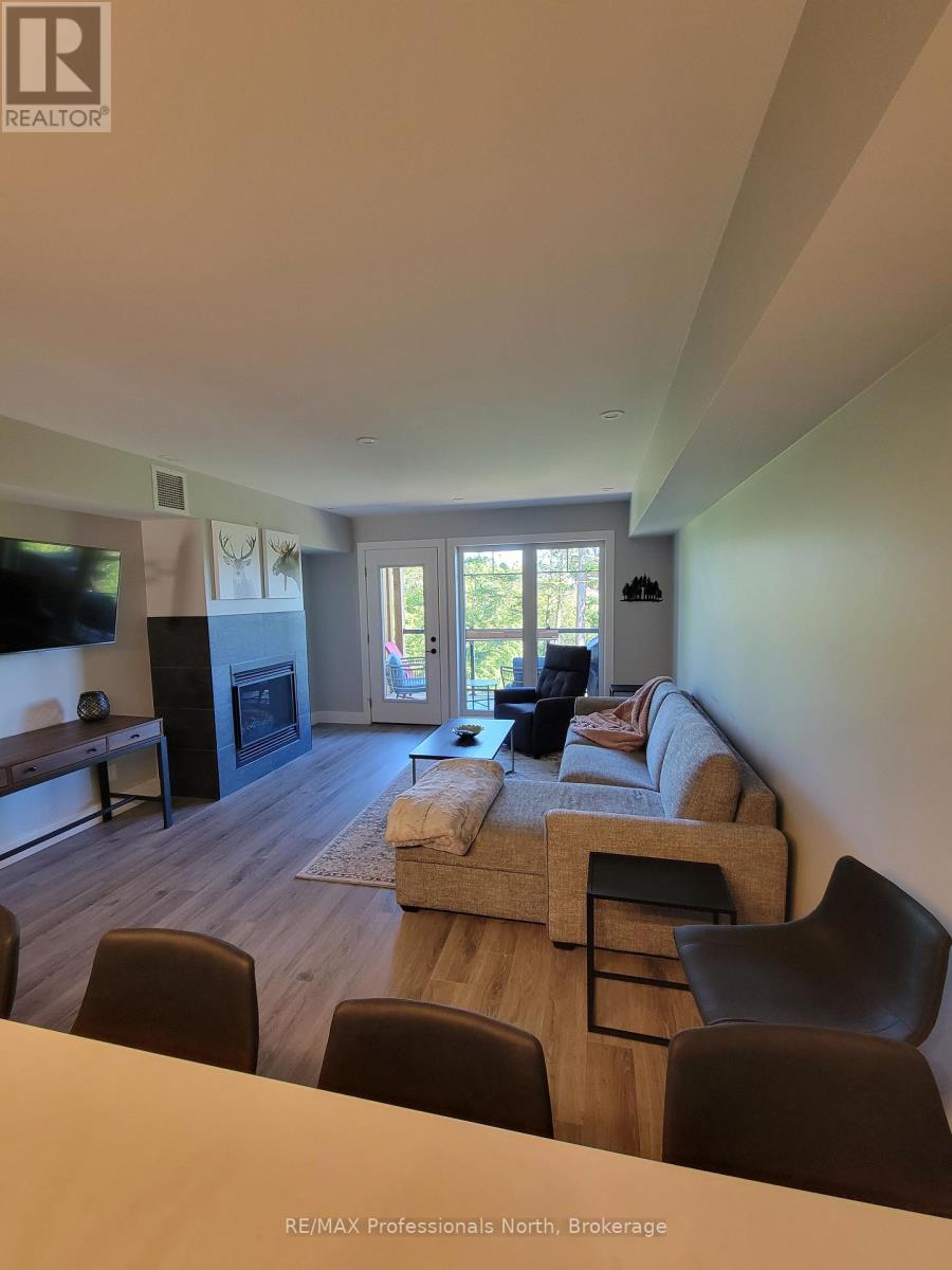 202 - 3 Tree Tops Lane, Huntsville, Ontario  P1H 1A9 - Photo 2 - X12245315