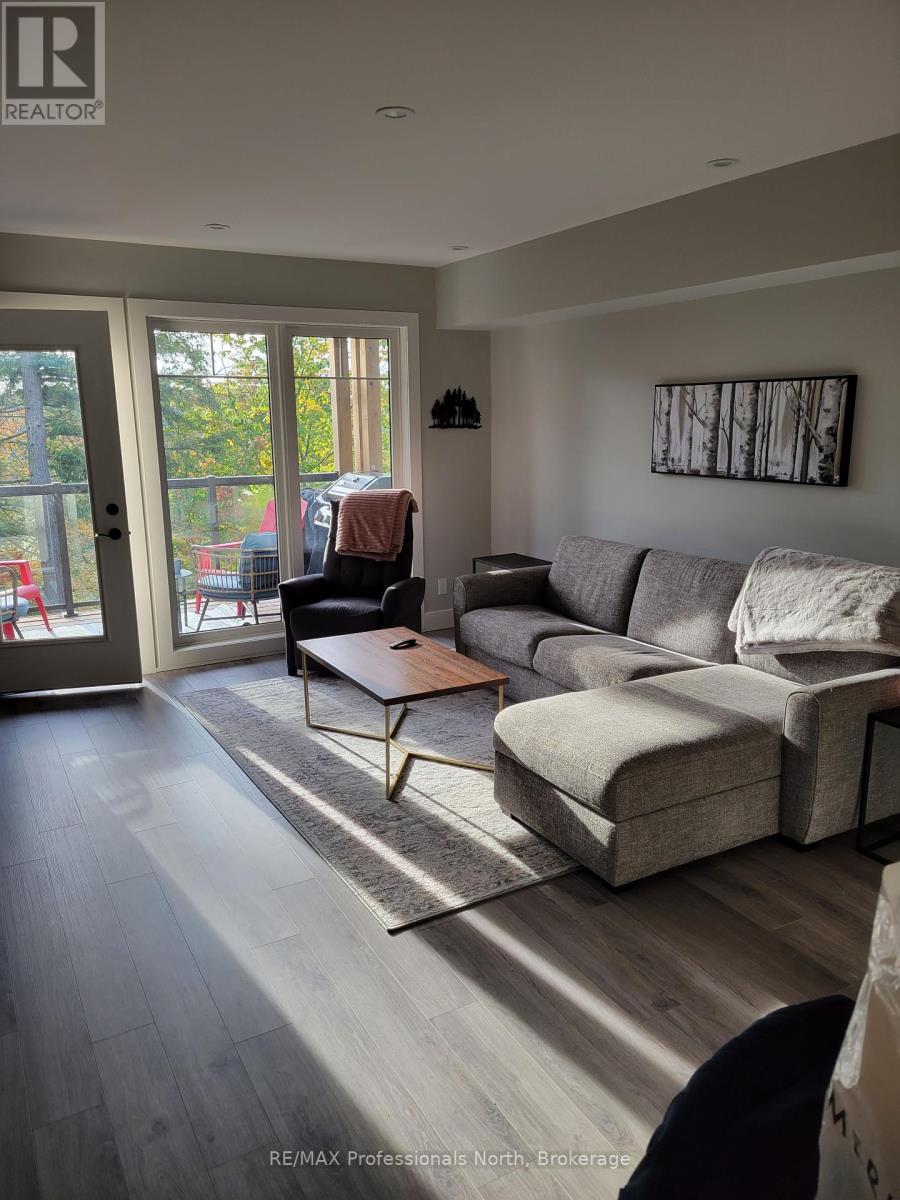 202 - 3 Tree Tops Lane, Huntsville, Ontario  P1H 1A9 - Photo 4 - X12245315