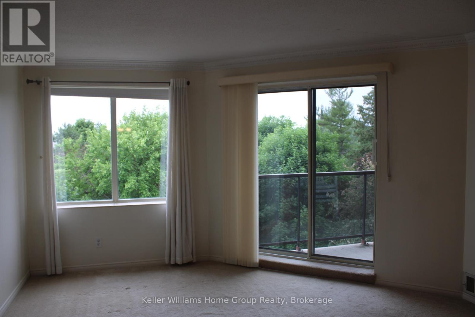 402 - 215 Scotland Street, Centre Wellington, Ontario  N1M 3L8 - Photo 2 - X12248088