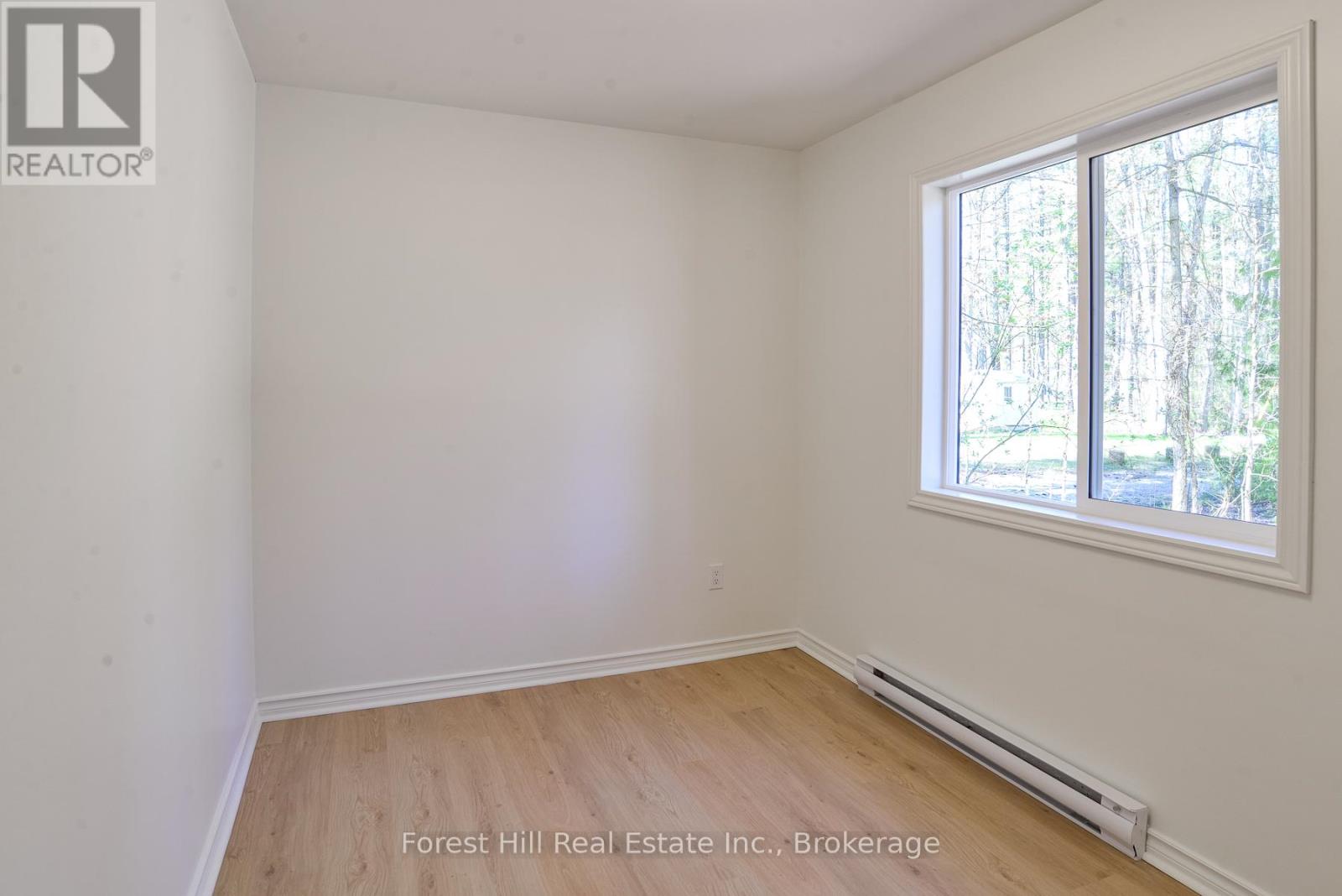 1036 Bagley Road, Gravenhurst, Ontario  P0E 1N0 - Photo 10 - X12248136