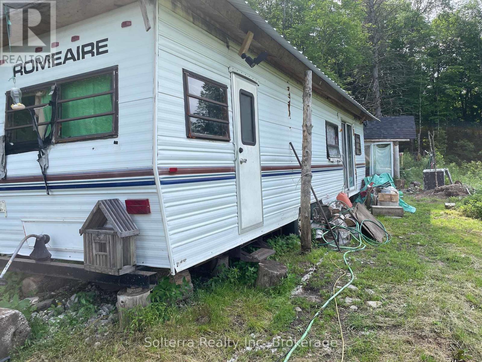 1311 Nelson Lake Road W, Magnetawan, Ontario  P0A 1P0 - Photo 5 - X12259020