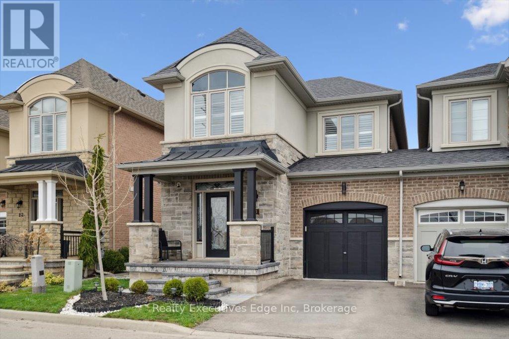 31 Rainforest Lane, Halton Hills, Ontario  L7G 0L8 - Photo 2 - W12263437