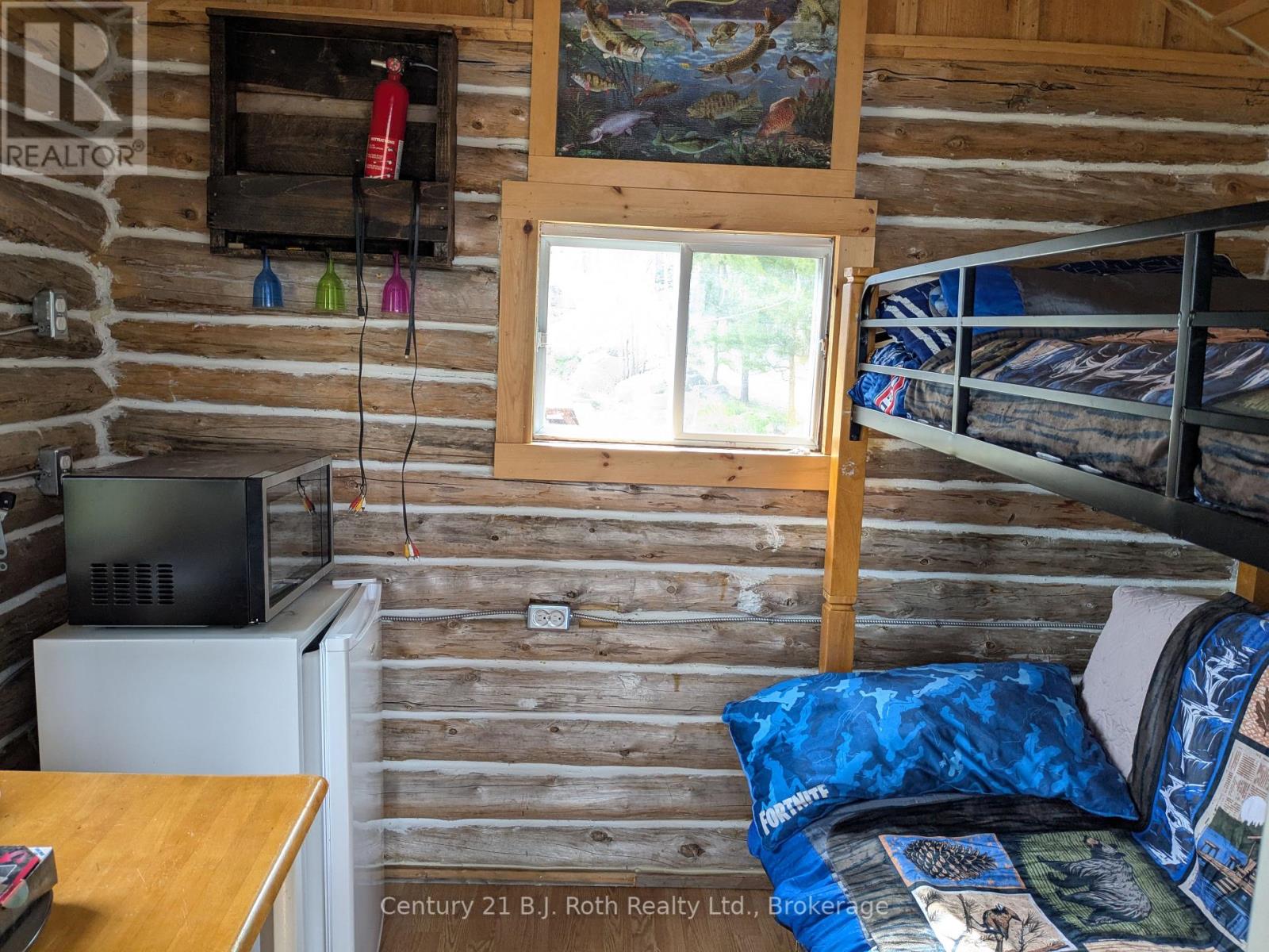 77 Holden Road, Magnetawan, Ontario  P0A 1P0 - Photo 14 - X12266253