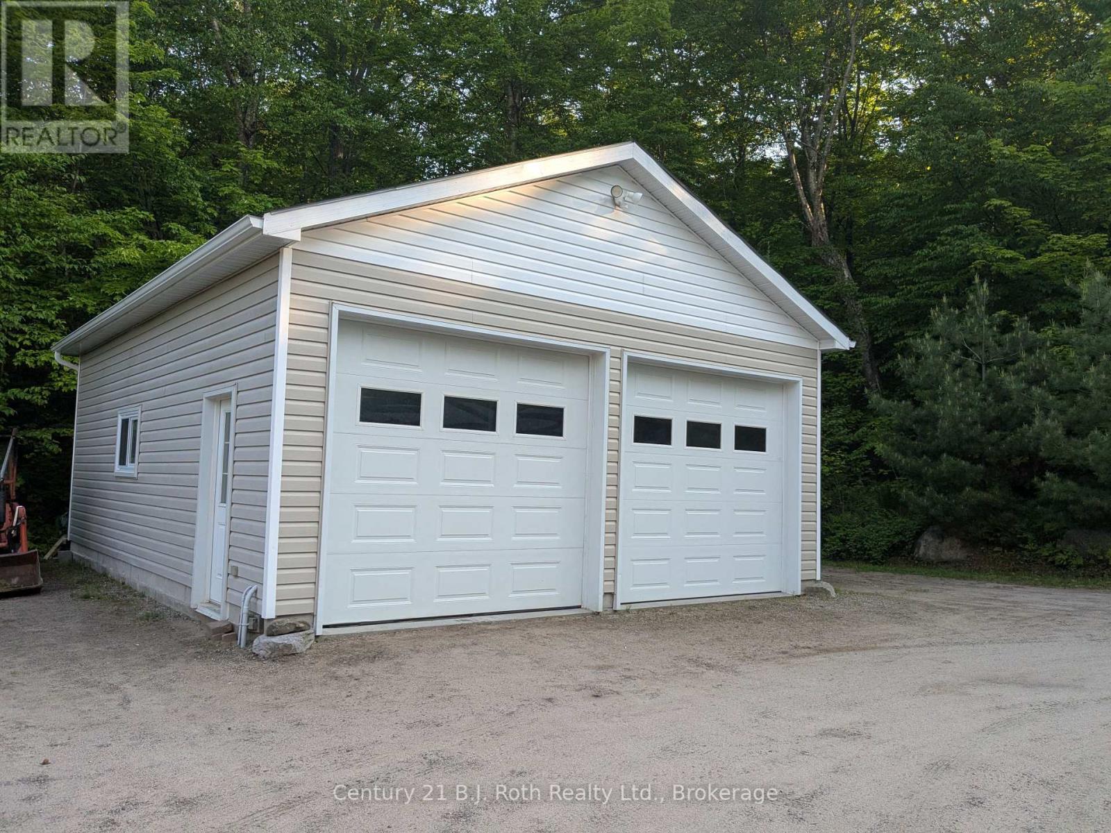 77 Holden Road, Magnetawan, Ontario  P0A 1P0 - Photo 2 - X12266253