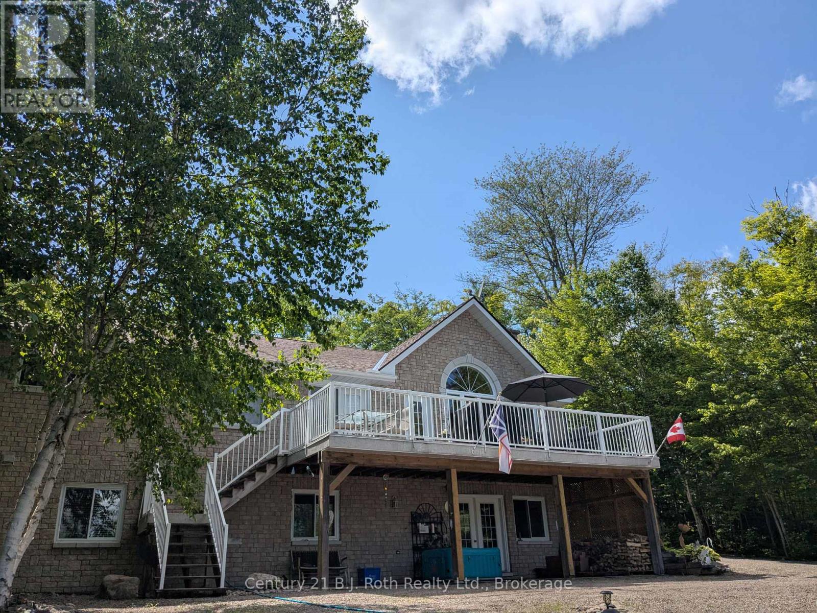 77 Holden Road, Magnetawan, Ontario  P0A 1P0 - Photo 3 - X12266253
