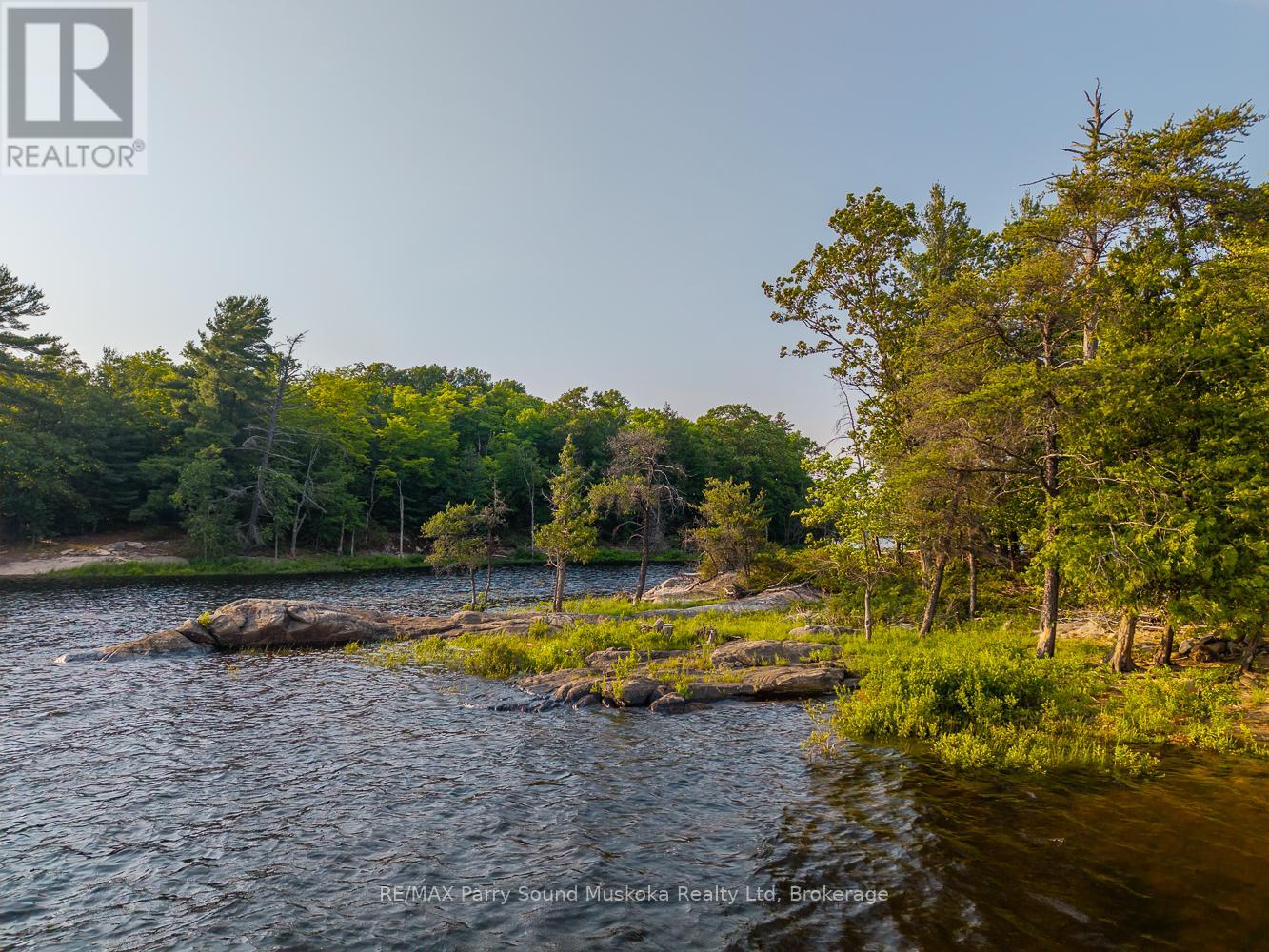 28307 Wahwashkesh Lake, Whitestone, Ontario  P0A 1G0 - Photo 14 - X12268465