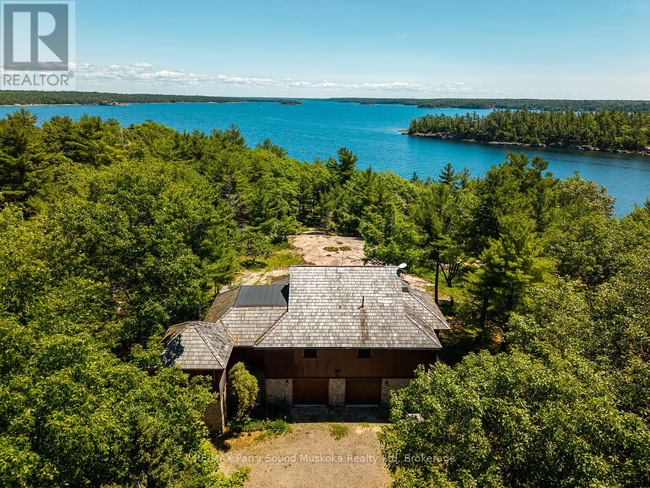 47 Linda Lane E, Carling, Ontario  P0G 1G0 - Photo 6 - X12270543