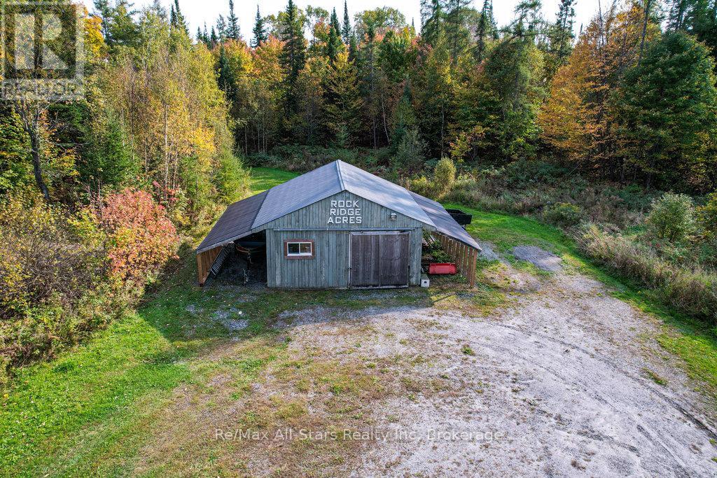 410 Etwell Road, Huntsville, Ontario  P1H 2J2 - Photo 38 - X12273214