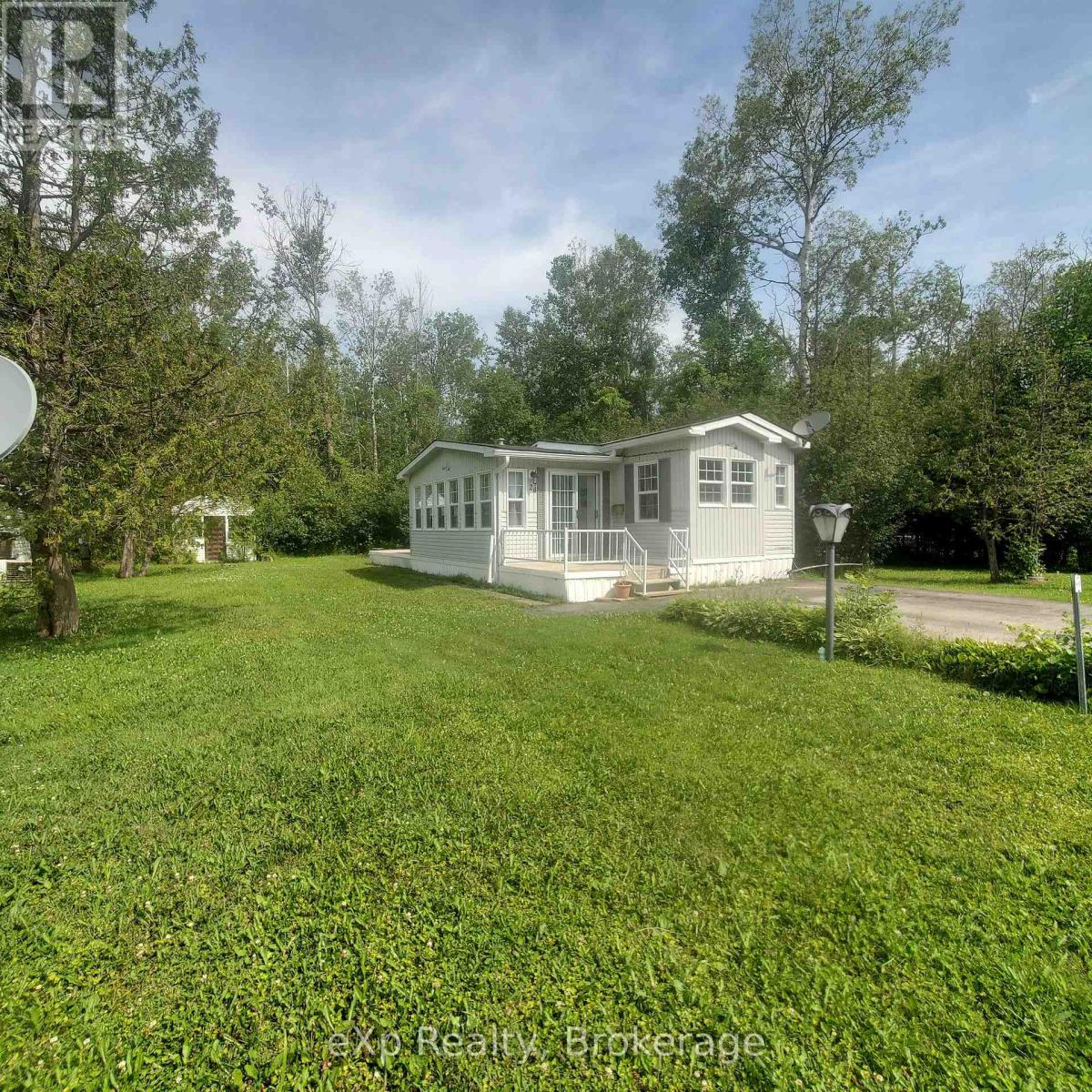 24 Prince Charles Avenue N, Springwater, Ontario  L0L 1P0 - Photo 1 - S12281068