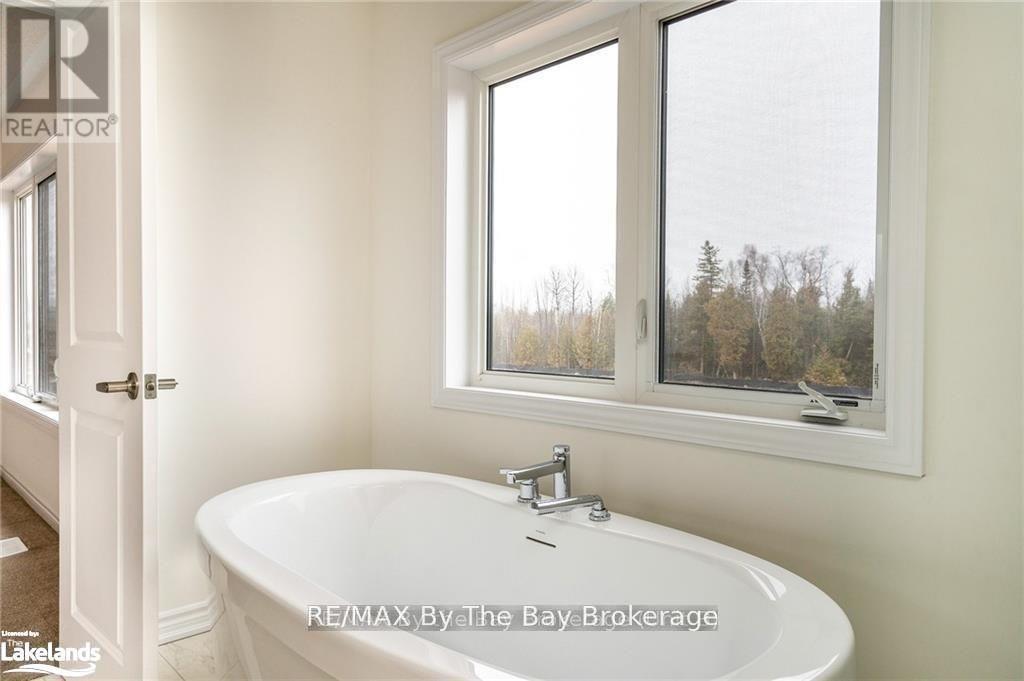 24 Simona Avenue, Wasaga Beach, Ontario  L9Z 0L4 - Photo 10 - S12303489