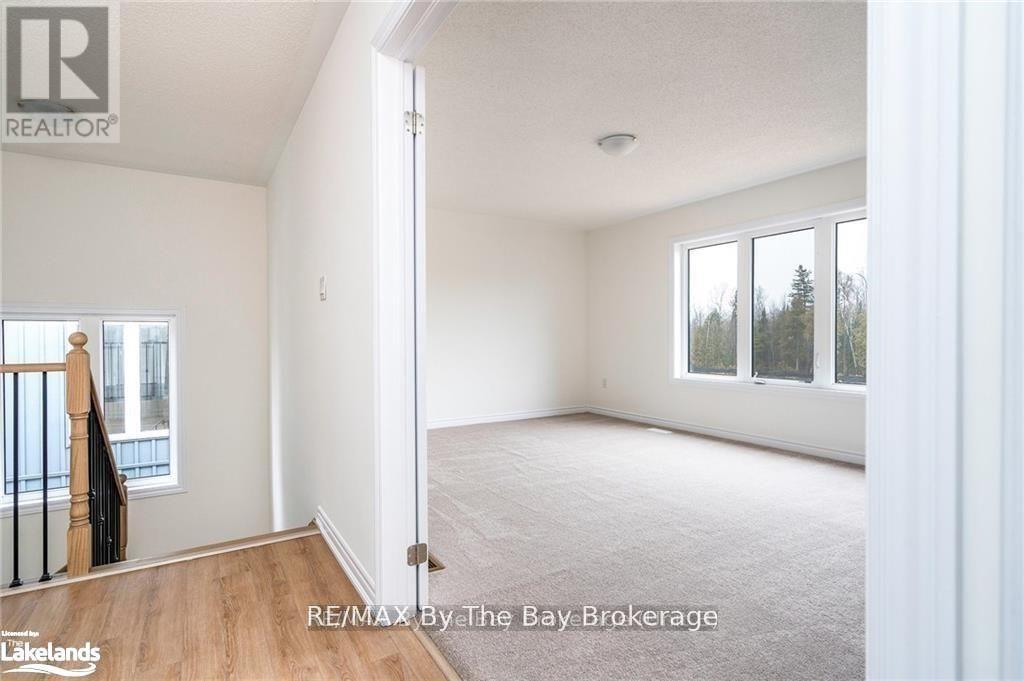 24 Simona Avenue, Wasaga Beach, Ontario  L9Z 0L4 - Photo 7 - S12303489