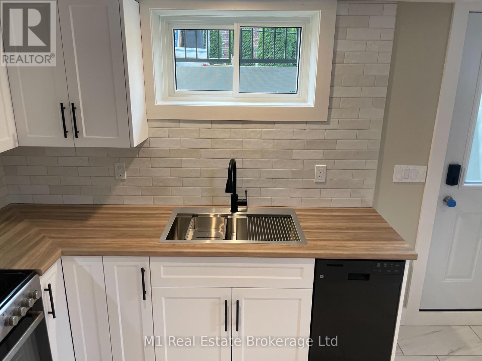 Ll - 18 Promenade Road, Guelph, Ontario  N1E 5Y7 - Photo 3 - X12310197