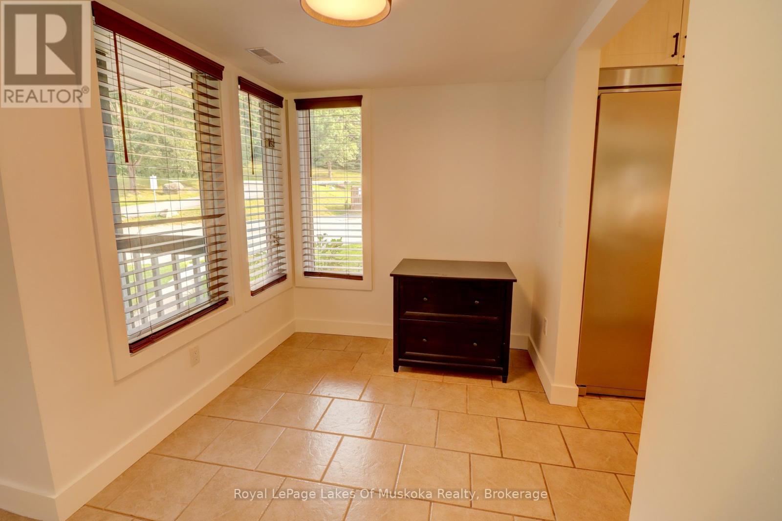 8 - 1561 Hidden Valley Road, Huntsville, Ontario  P1H 1A4 - Photo 3 - X12329402