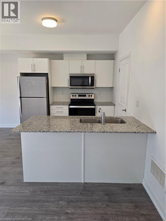205 West Oak Trail Unit# 50, Kitchener, Ontario  N2R 0R9 - Photo 4 - 40753349