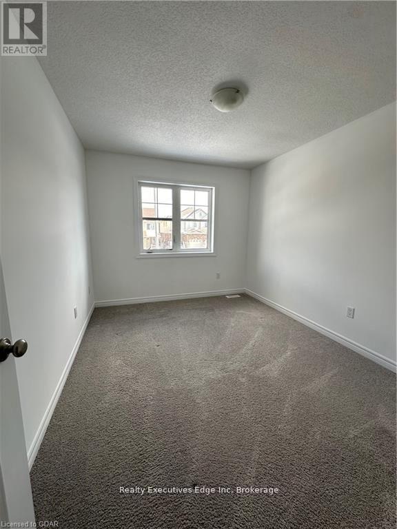 49 Dallan Drive, Guelph, Ontario  N1L 0N2 - Photo 8 - X12364904