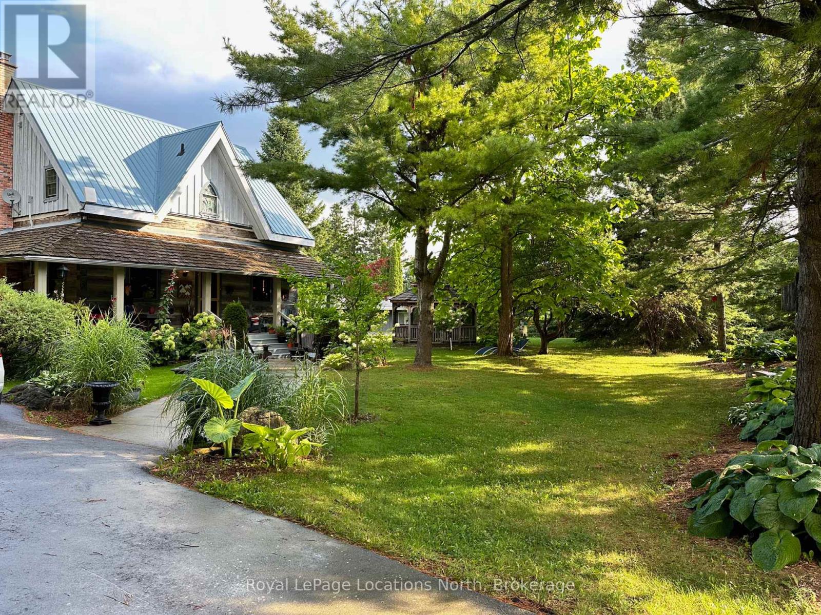 115 Tyrol Avenue, Blue Mountains, Ontario  N0H 2E0 - Photo 1 - X12366956