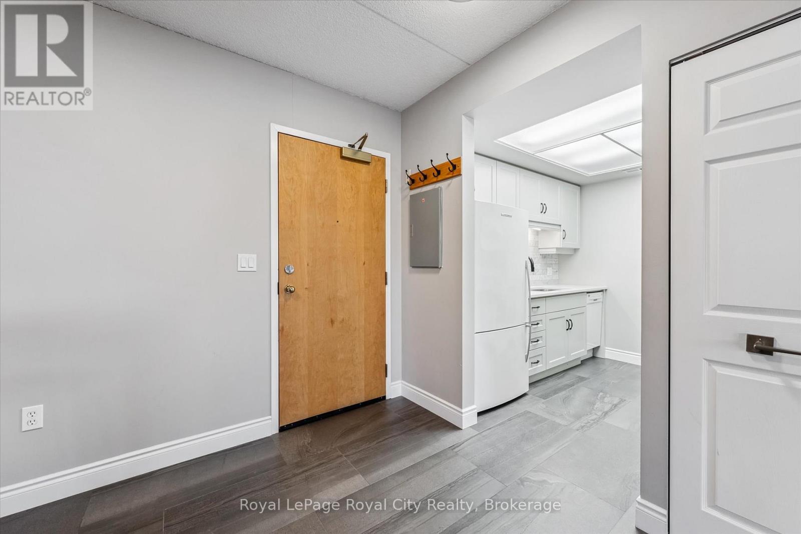 403 - 105 Bagot Street, Guelph, Ontario  N1H 8H4 - Photo 2 - X12383350