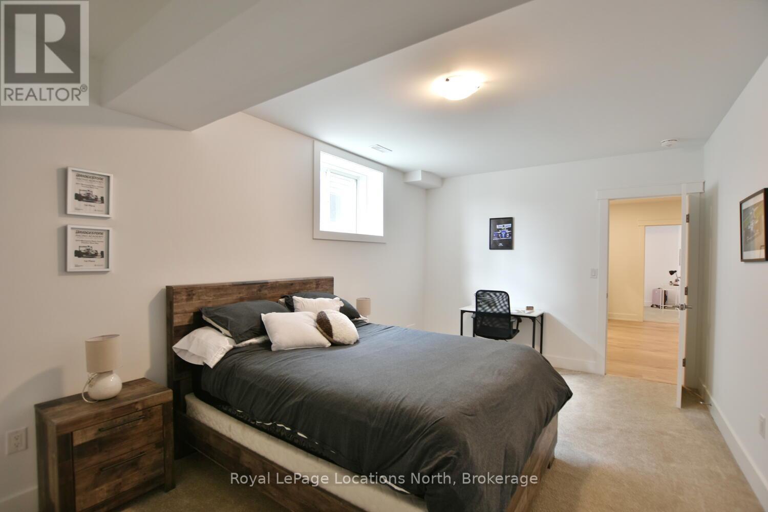 216 Snowberry Lane, Georgian Bluffs, Ontario  N0H 1S0 - Photo 38 - X12409161