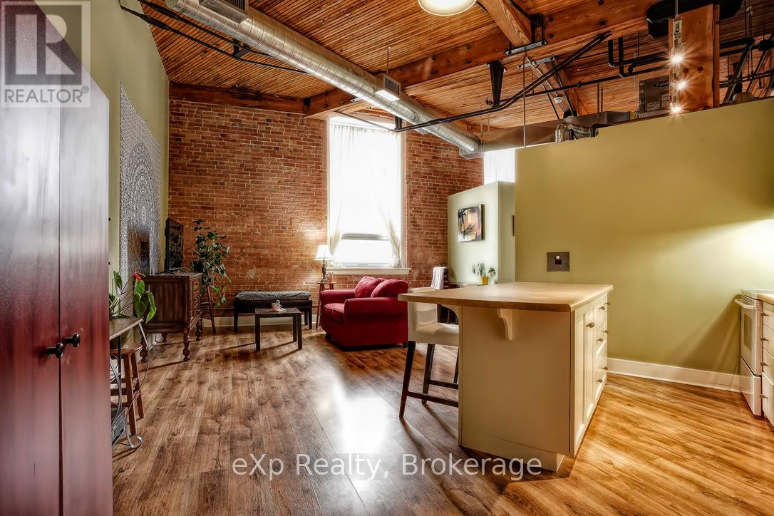 111 - 26 Ontario Street, Guelph, Ontario  N1E 7K1 - Photo 1 - X12448563