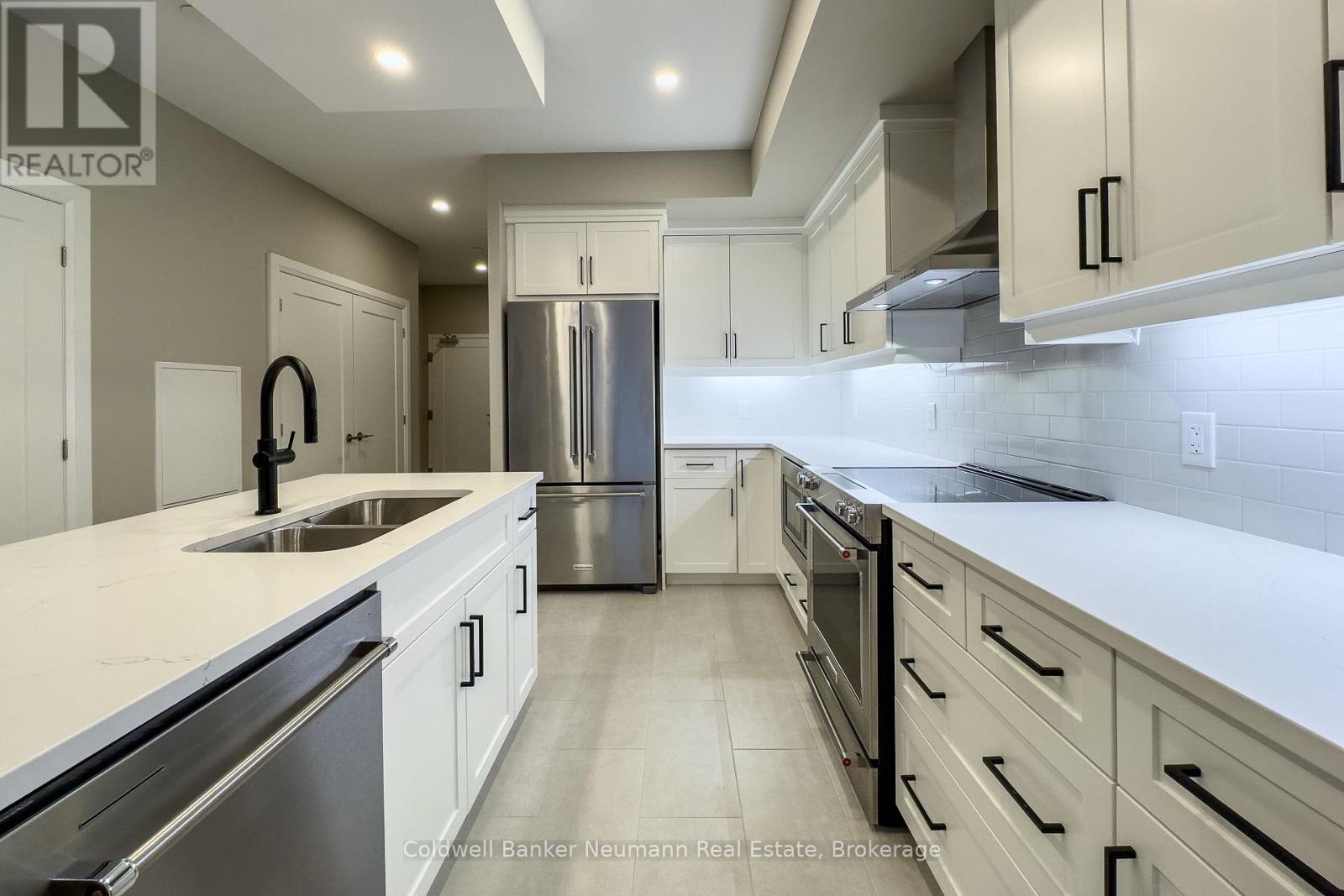 209 - 71 Wyndham Street S, Guelph, Ontario  N1E 5R3 - Photo 1 - X12473563