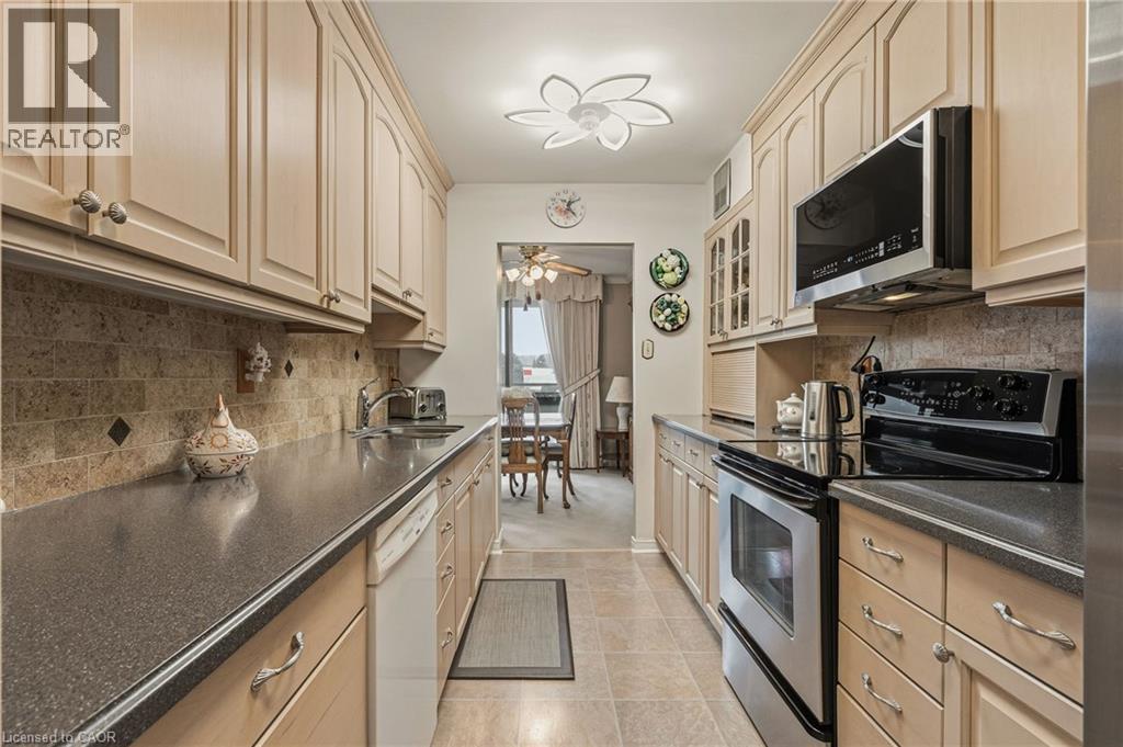 2055 Upper Middle Road Unit# 407, Burlington, Ontario  L7P 3P4 - Photo 4 - 40803906