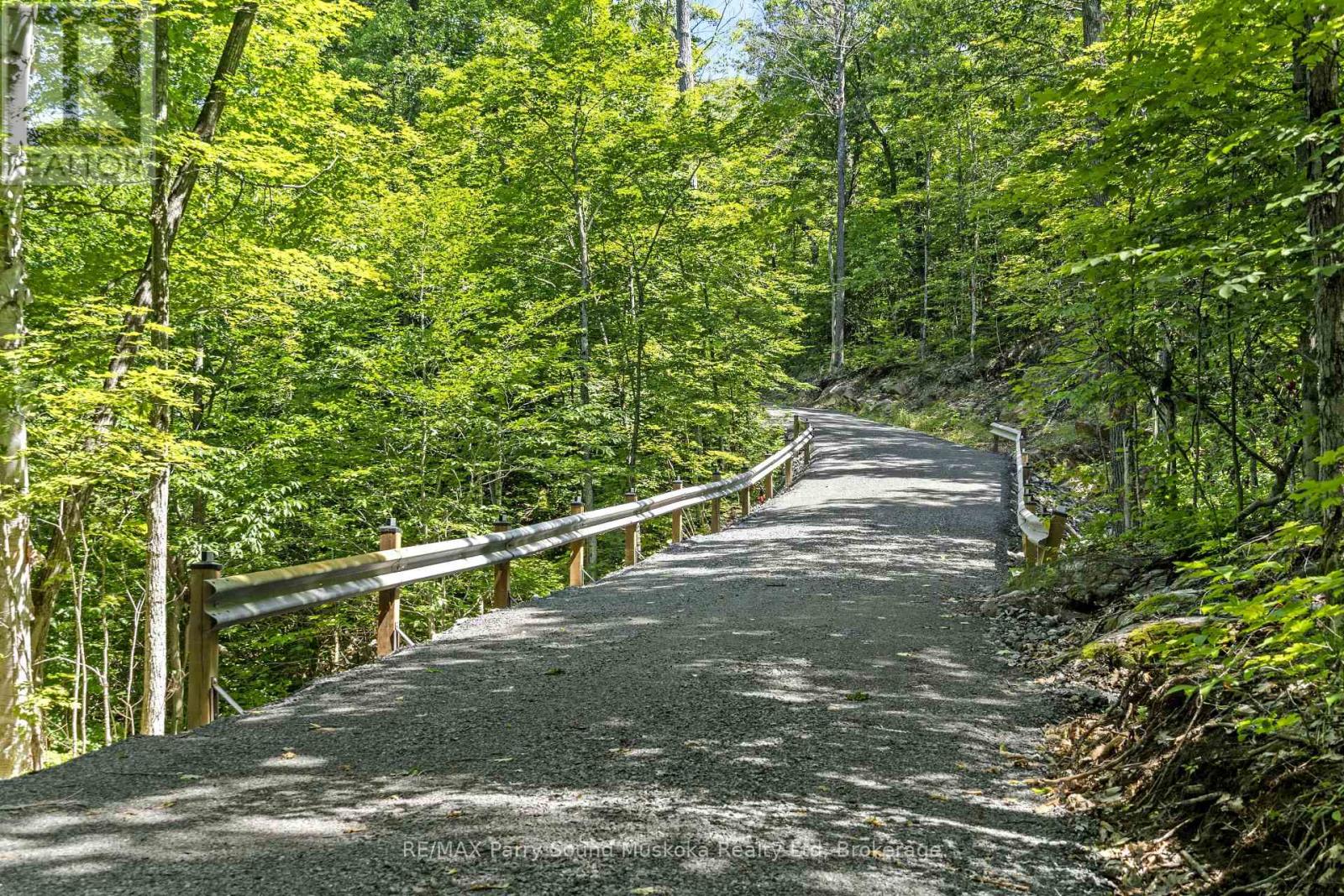 38 Fun Cottage Lane, Mcdougall, Ontario  P2A 2W7 - Photo 22 - X12857882