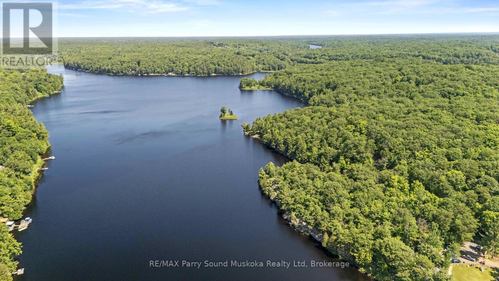 38 Fun Cottage Lane, Mcdougall, Ontario  P2A 2W7 - Photo 6 - X12857882